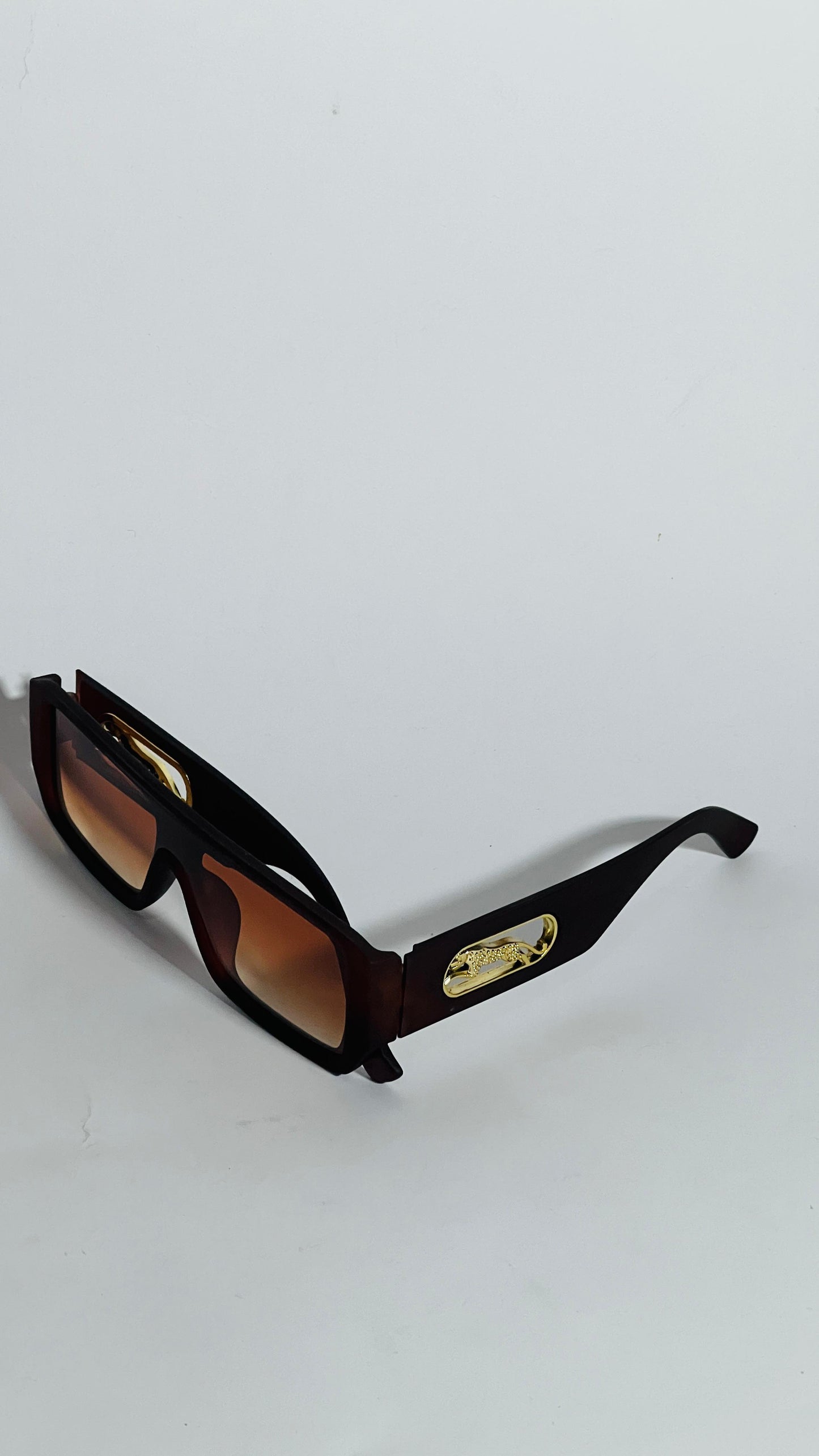 The Trendsetter: Elite Rectangular Shield Sunglasses.
