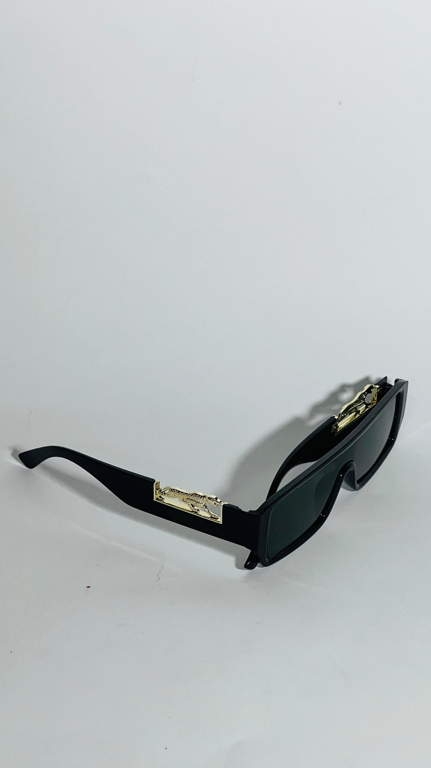 The Trendsetter: Elite Rectangular Shield Sunglasses.